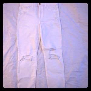 White distressed skinny ankle jeans
